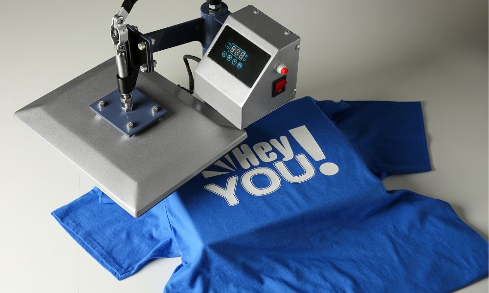 Heat press machine with vinyl printed t-shirt